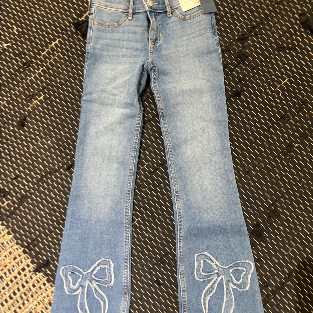 Abercrombie Kids Light Blue Boot Leg Jeans with Bow Accents